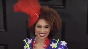 Singer Faces Backlash Over Outfit With 'Controversial' Political Message At The Grammys