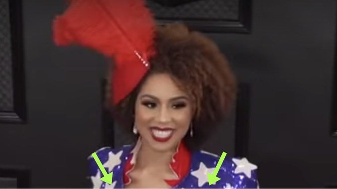 Singer Faces Backlash Over Outfit With 'Controversial' Political Message At The Grammys