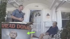 Police Order Man To Take Down 'Obscene' Sign From His Lawn Or Face Criminal Charges