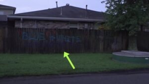 Teacher Fired After Messages Spray-Painted Outside Her Home Spark Controversy