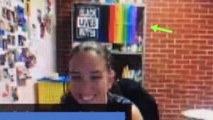 High School Teacher Turns Heads After Hanging 'Controversial' Flags In Virtual Classroom