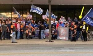 Police Department Launches Investigation Over 'Controversial' Photo Involving Several Officers