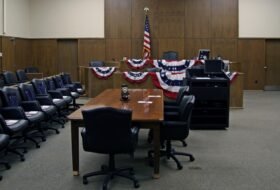 Inside an empty courtroom