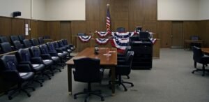 Inside an empty courtroom