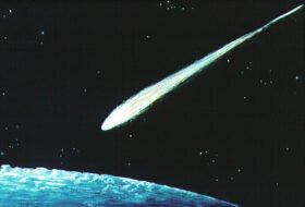 A meteor crashing through the night sky
