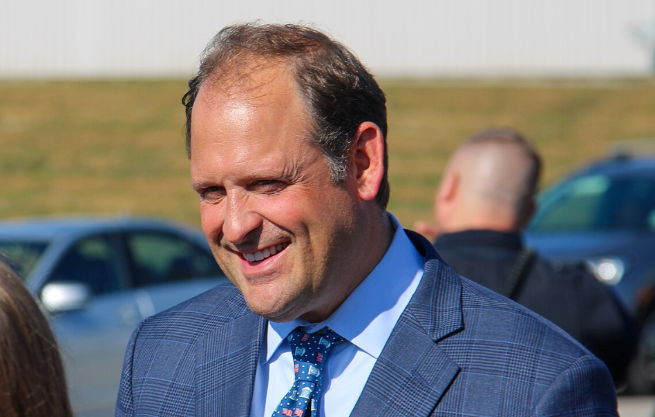 Congressman Andy Barr smiling outside during an event