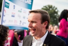 Senator Murphy speaking at an event outside