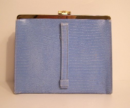 women's handbag against blank background