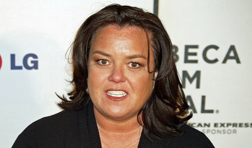 Rosie O'Donnell smiling on the red carpet