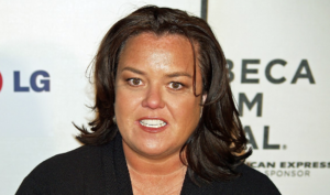 Rosie O'Donnell smiling on the red carpet